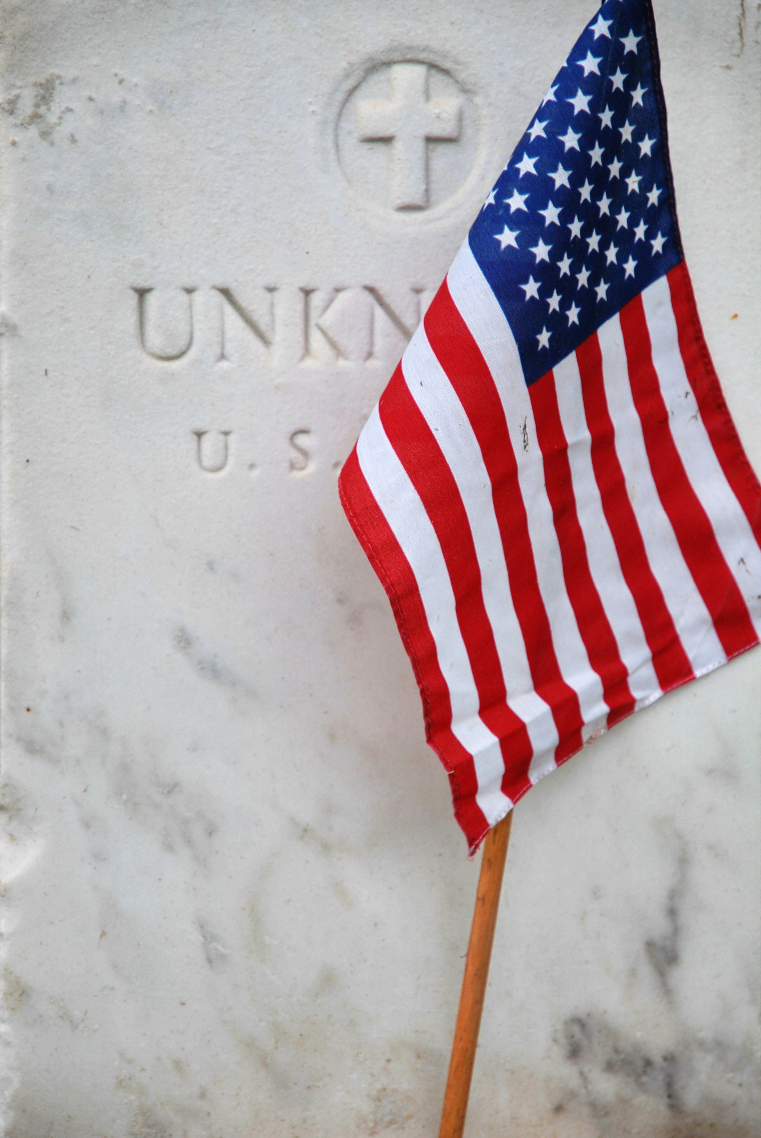 us a flag on white concrete wall